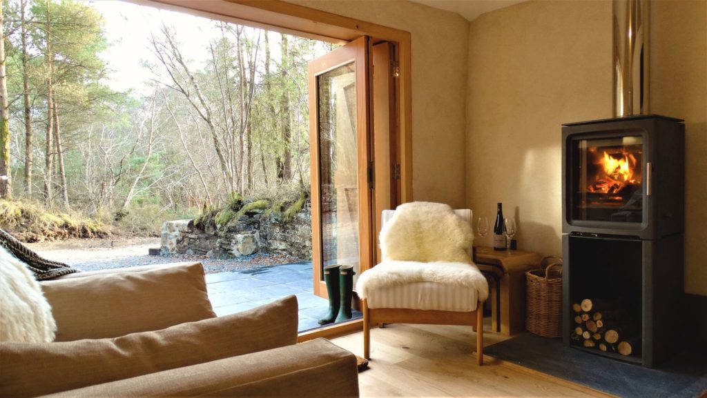 Romantic Lounge Area with Log Fire Burning. Rock View Cottage