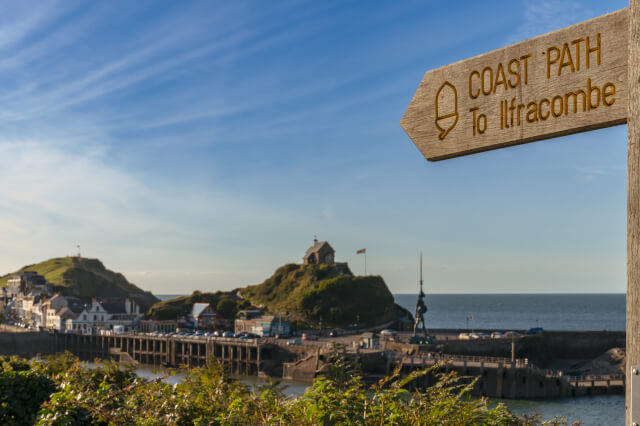 View of Ilfracombe, North Devon from the South West Coast Path with sign