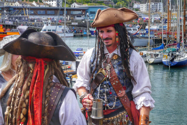 A man in pirate fancy dress at Brixham Pirate Festival.
