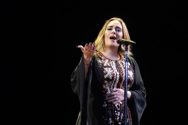 Adele during her headline set on the pyramid stage at Glastonbury Festival in 2016.