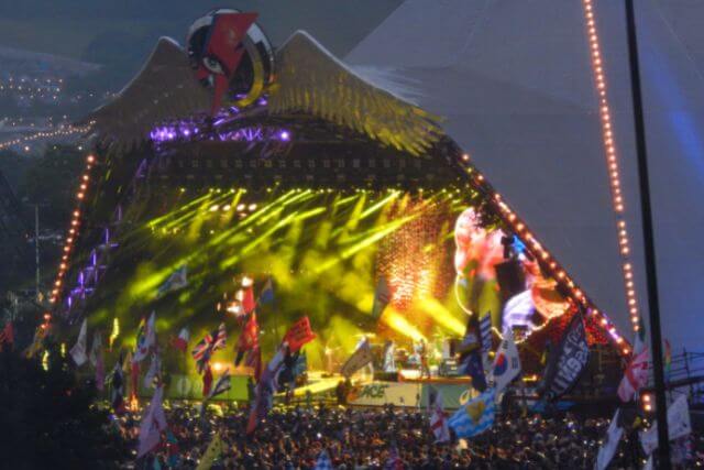 View of the Pyramid stage during Coldplay's headline set in 2016 at Glastonbury Festival in Somerset.