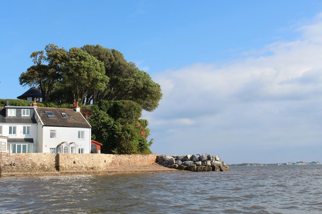 South West Holiday Let Market Insights Report 2024 | A view across the Exe Estuary of 1 The Quay, Lympstone.