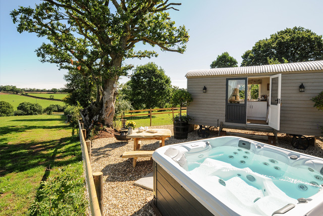 South West Holiday Let Market Insight Report 2024 | The hot tub and shepherd's hut at Orchard Retreat, Witheridge