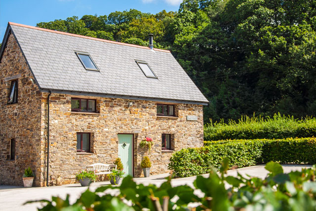 Outside view of Brightley Mill Barn, Okehampton, on a sunny day
